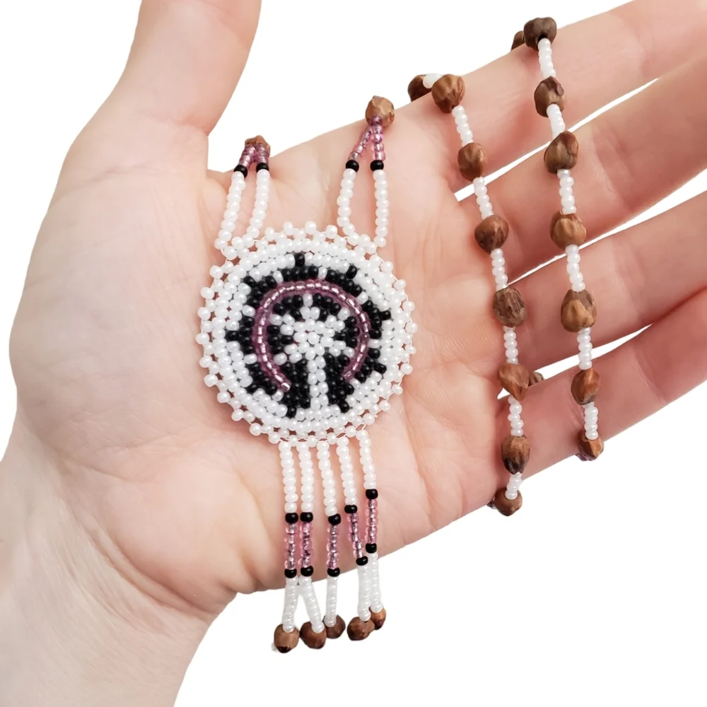 Handcrafted beaded pendant necklace with fringe